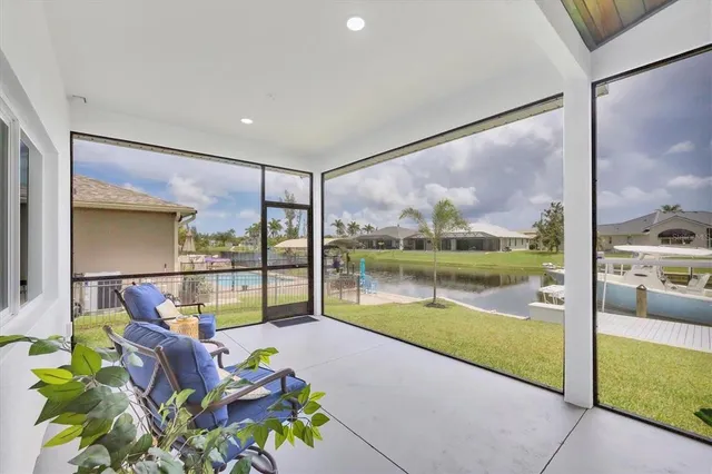 a view of a swimming pool with a patio