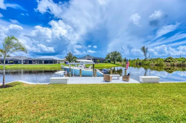 a view of swimming pool with a lake view