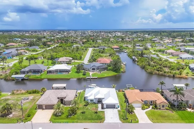 a bathroom with double vanity sinks and a mirror