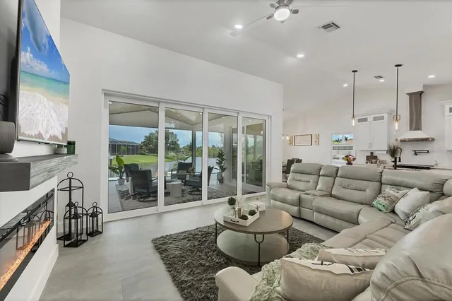 a kitchen that has a lot of cabinets in it and appliances