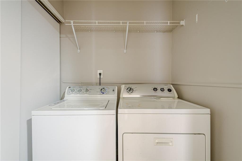 1106 Natchez Trace Atlanta, GA 30350 - Photo 18 of 40 a utility room with dryer and washer