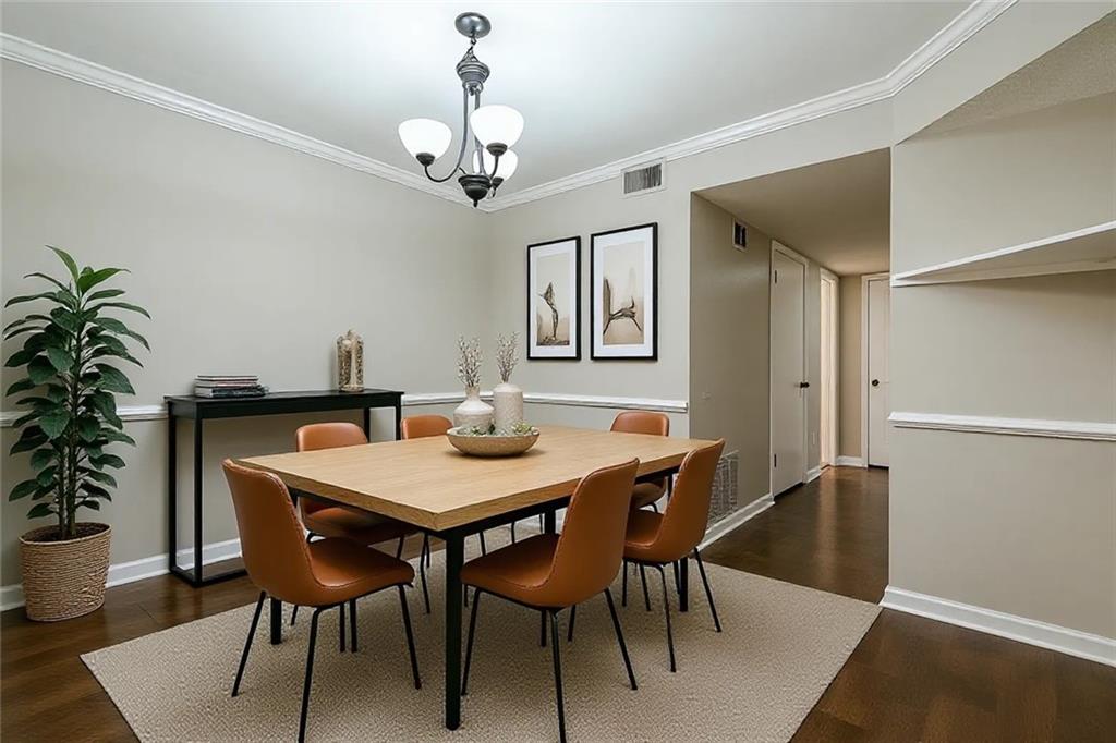 1106 Natchez Trace Atlanta, GA 30350 - Photo 7 of 40 a view of a dining room with furniture and wooden floor