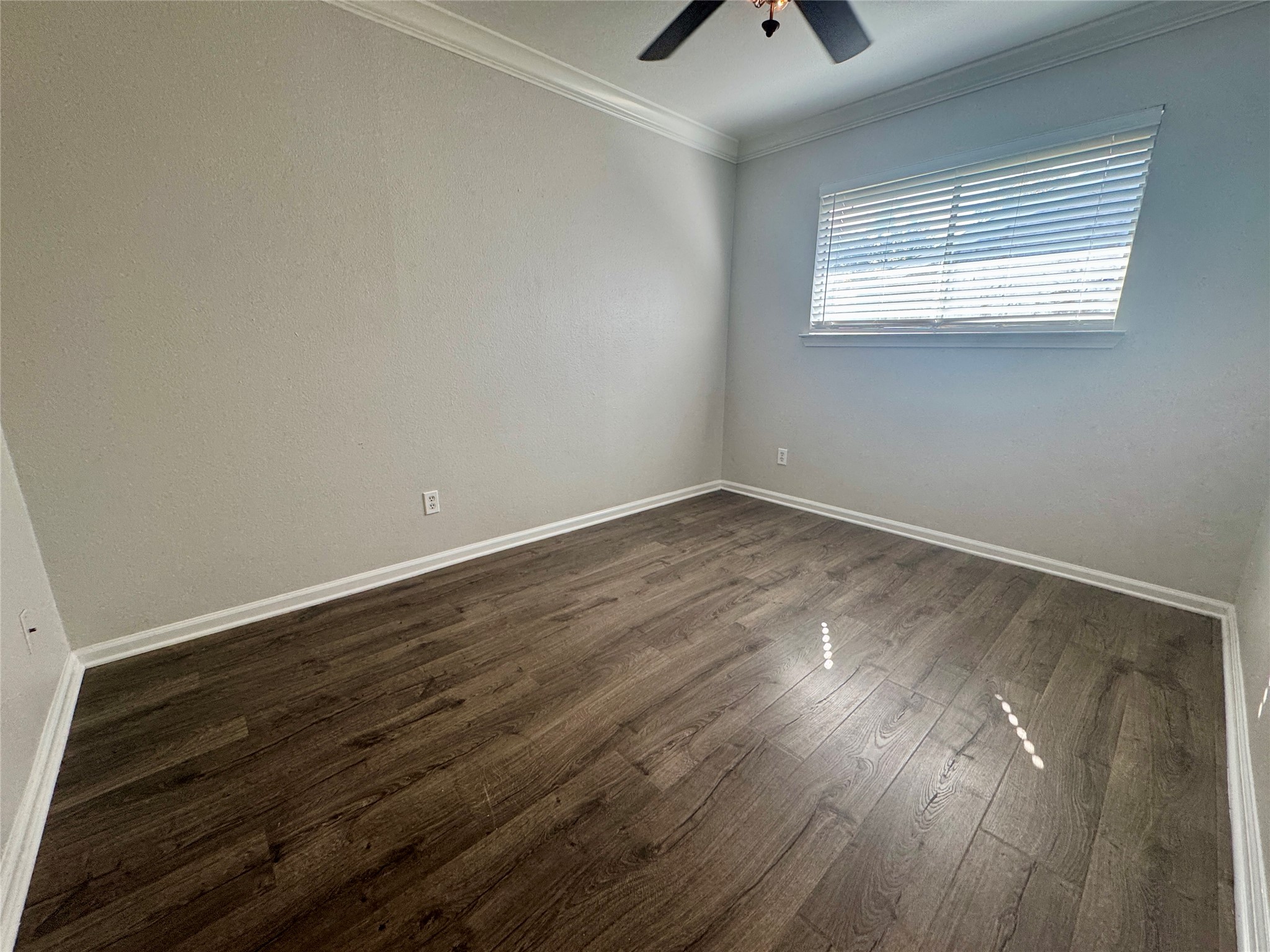 7315 Lunar Drive Austin, TX 78745 - Photo 13 of 17 wooden floor in an empty room with a window