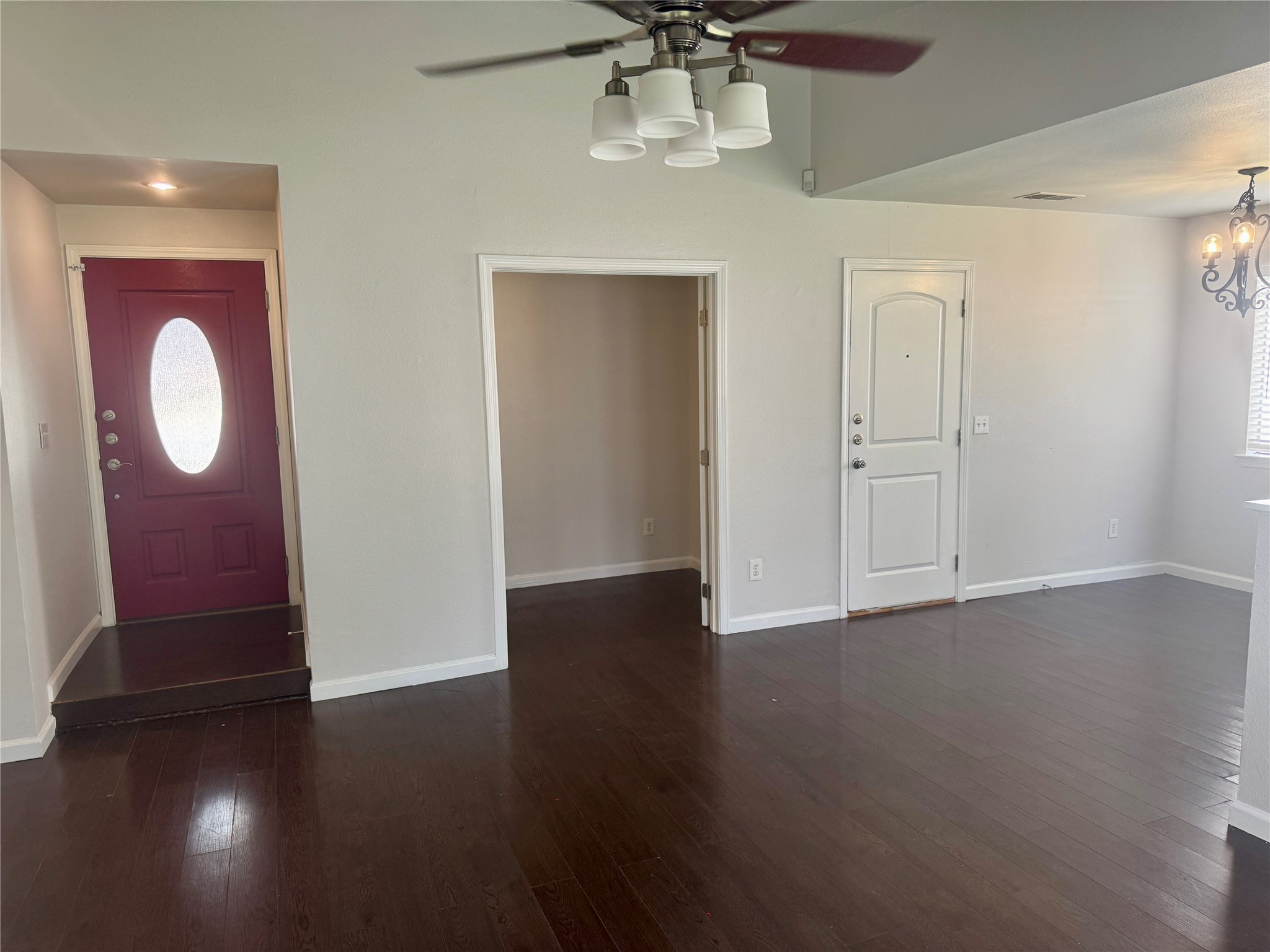 7315 Lunar Drive Austin, TX 78745 - Photo 7 of 17 a view of an entryway with wooden floor