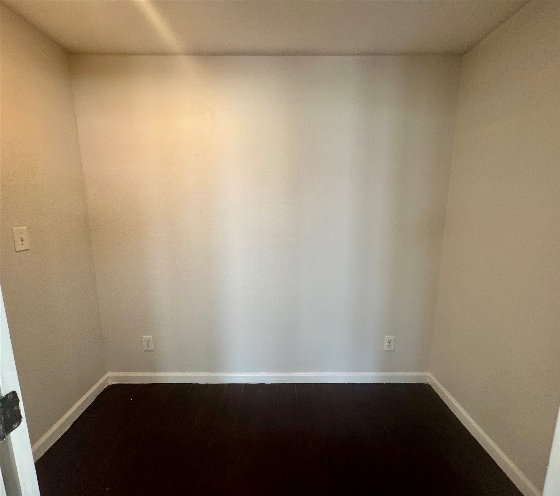 7315 Lunar Drive Austin, TX 78745 - Photo 8 of 17 a view of an empty room with wooden floor and a window