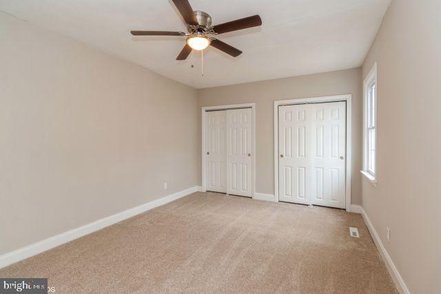 126 4th Avenue Mount Ephraim, NJ 08059 - Photo 20 of 26 an empty room with chandelier fan