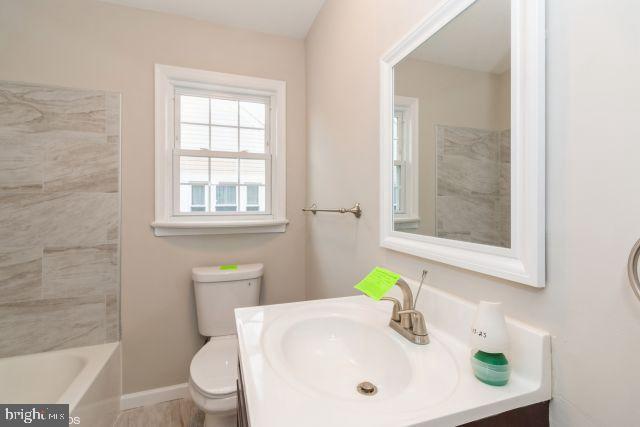 126 4th Avenue Mount Ephraim, NJ 08059 - Photo 22 of 26 a bathroom with a sink toilet and shower