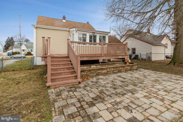 126 4th Avenue Mount Ephraim, NJ 08059 - Photo 4 of 26 a view of a house with a yard