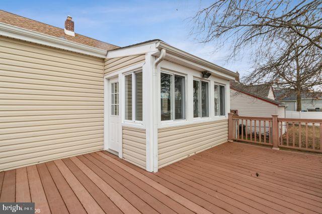 126 4th Avenue Mount Ephraim, NJ 08059 - Photo 6 of 26 a view of a house with a deck