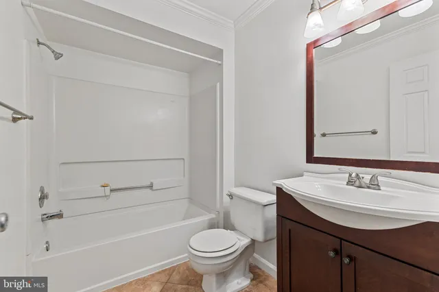 a bathroom with a sink toilet and vanity