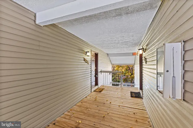 a porch with seating space