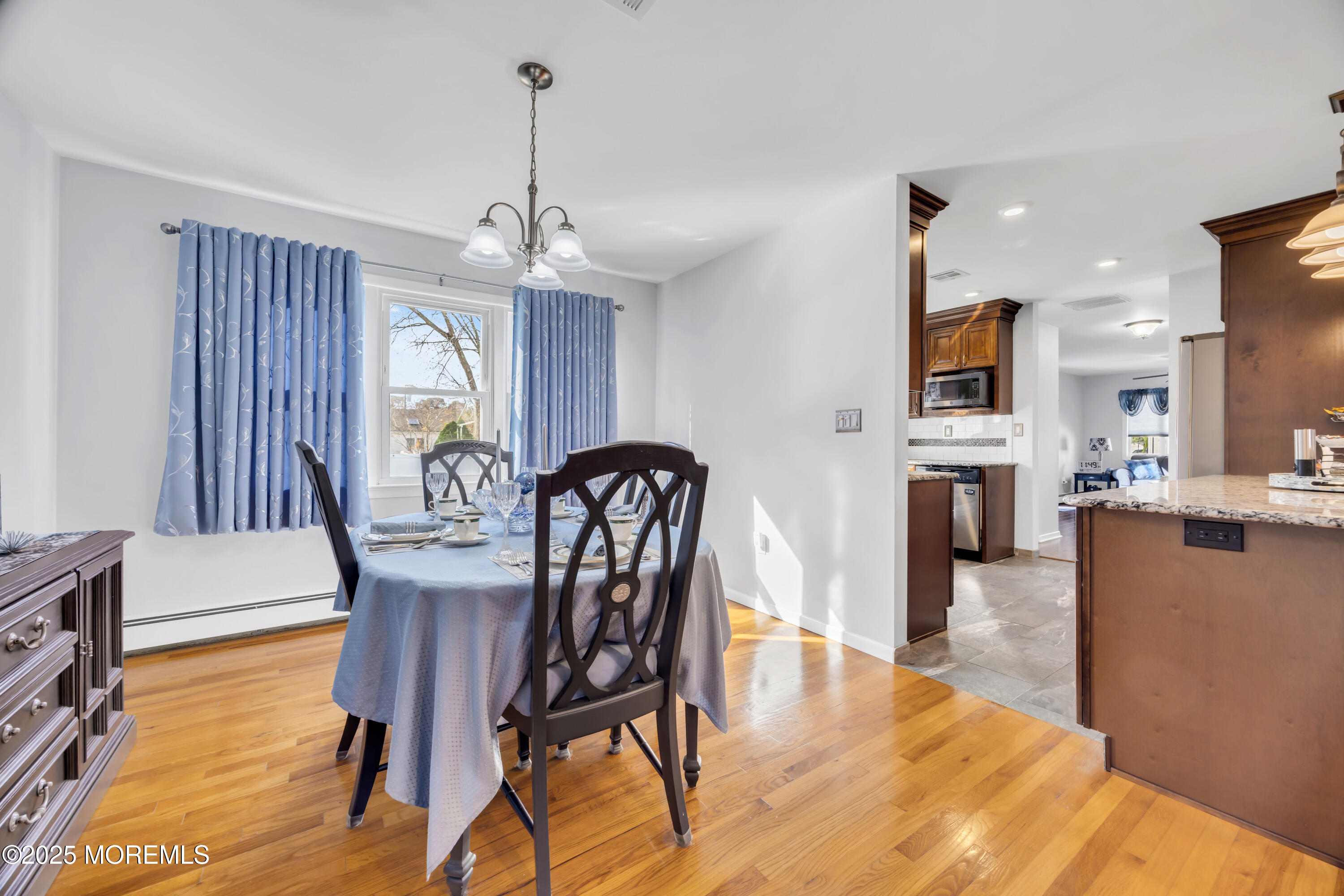 308 Green Tree Road Brick, NJ 08724 - Photo 12 of 58 a view of a a dining room with furniture window and wooden floor