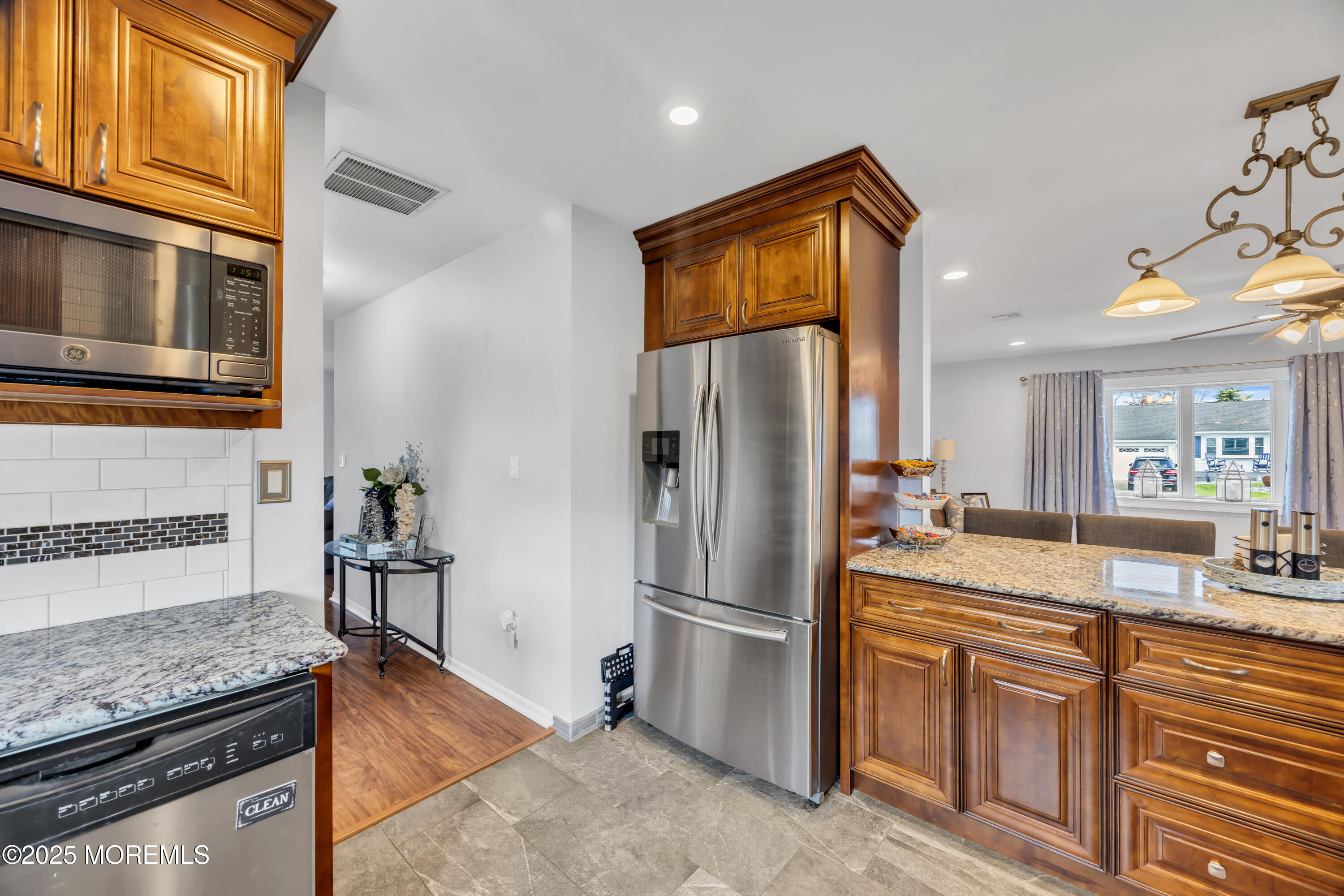 308 Green Tree Road Brick, NJ 08724 - Photo 16 of 58 a kitchen with stainless steel appliances granite countertop a refrigerator stove and sink