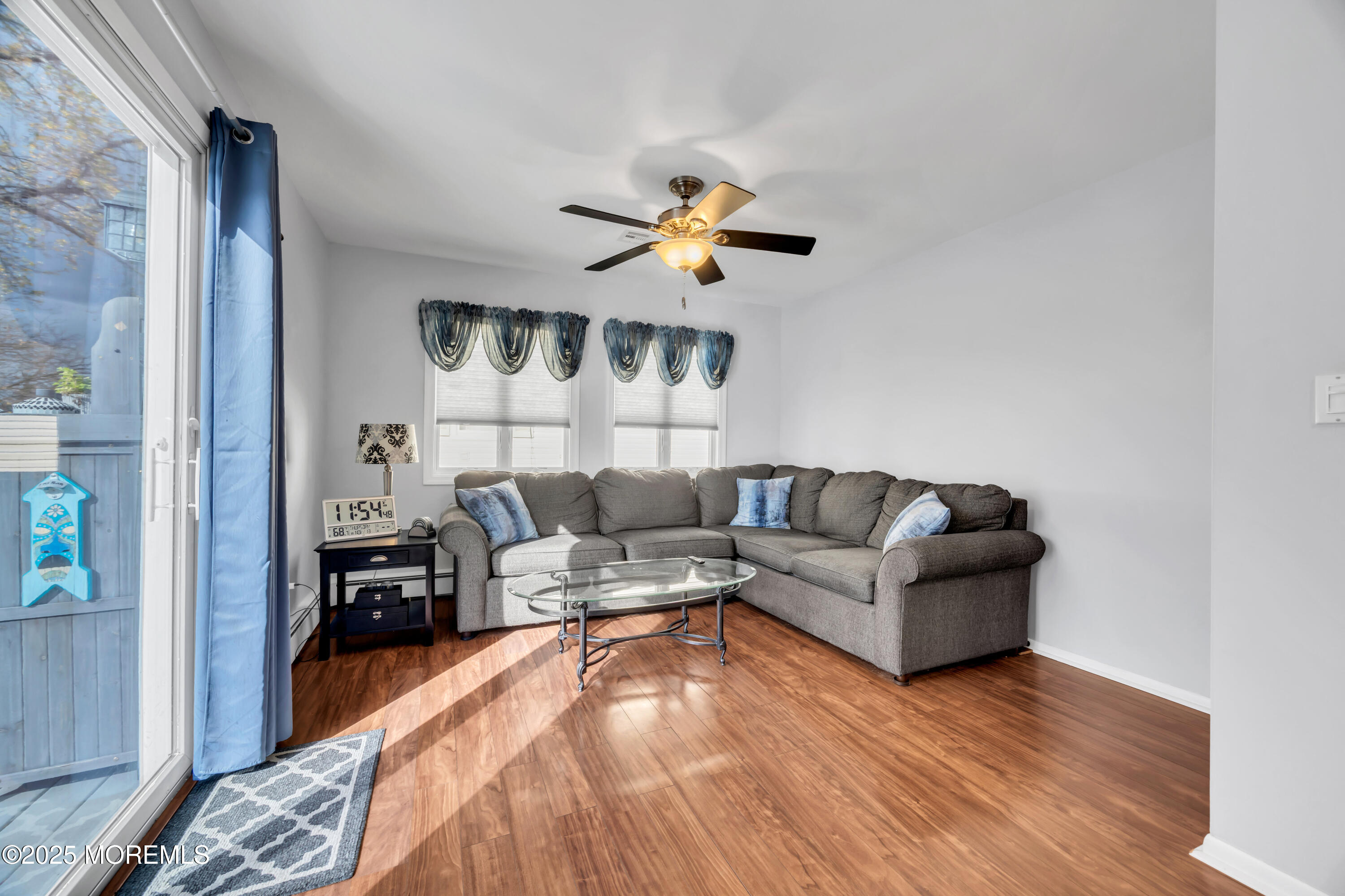 308 Green Tree Road Brick, NJ 08724 - Photo 20 of 58 a living room with furniture and a wooden floor