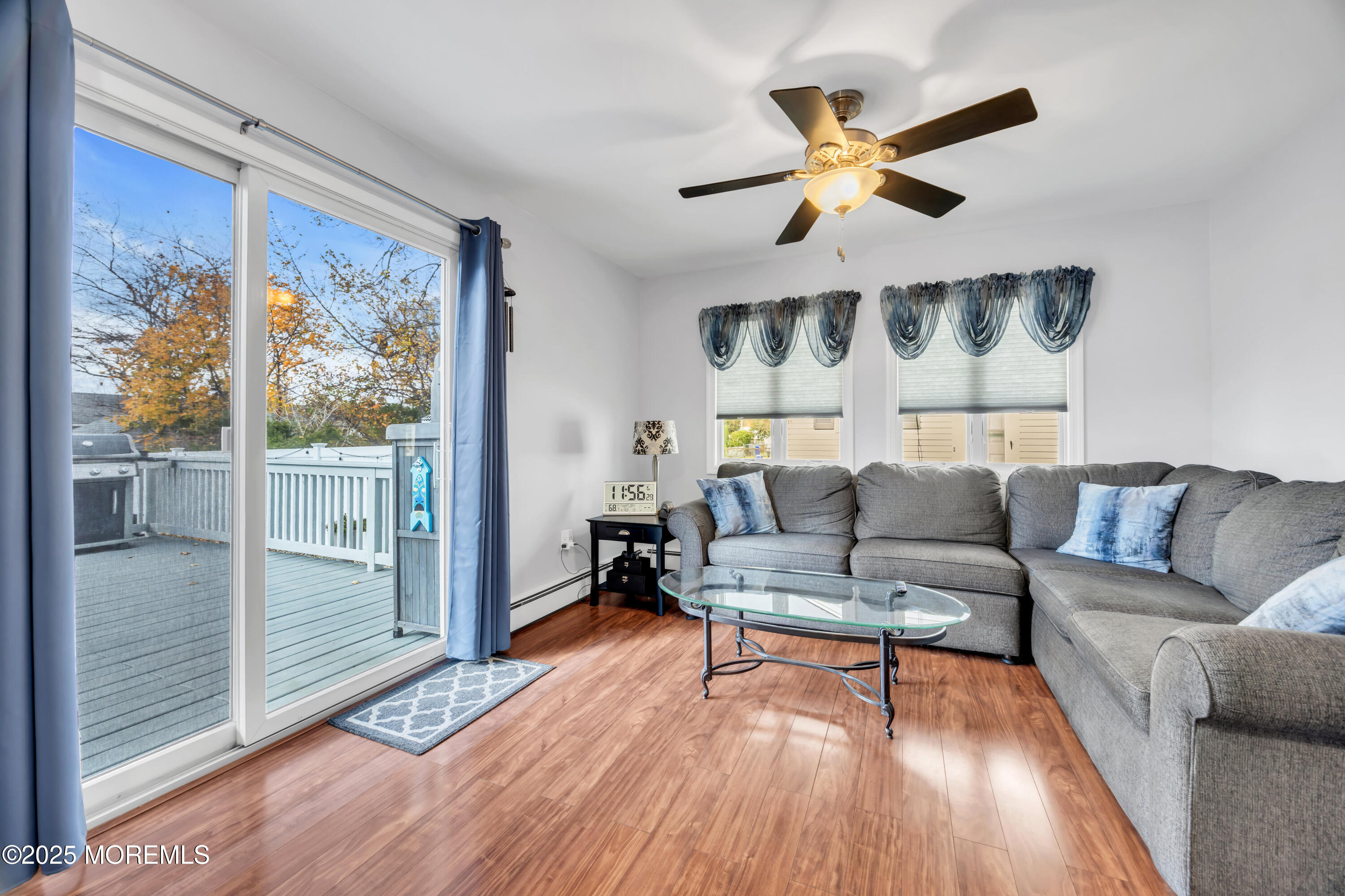 308 Green Tree Road Brick, NJ 08724 - Photo 23 of 58 a living room with furniture and a large window