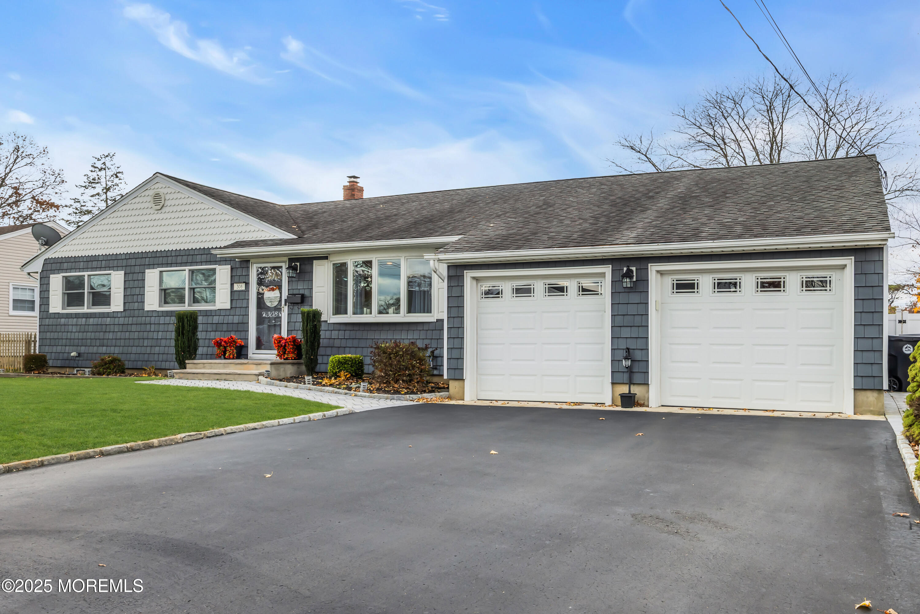 308 Green Tree Road Brick, NJ 08724 - Photo 4 of 58 front view of a house with a yard