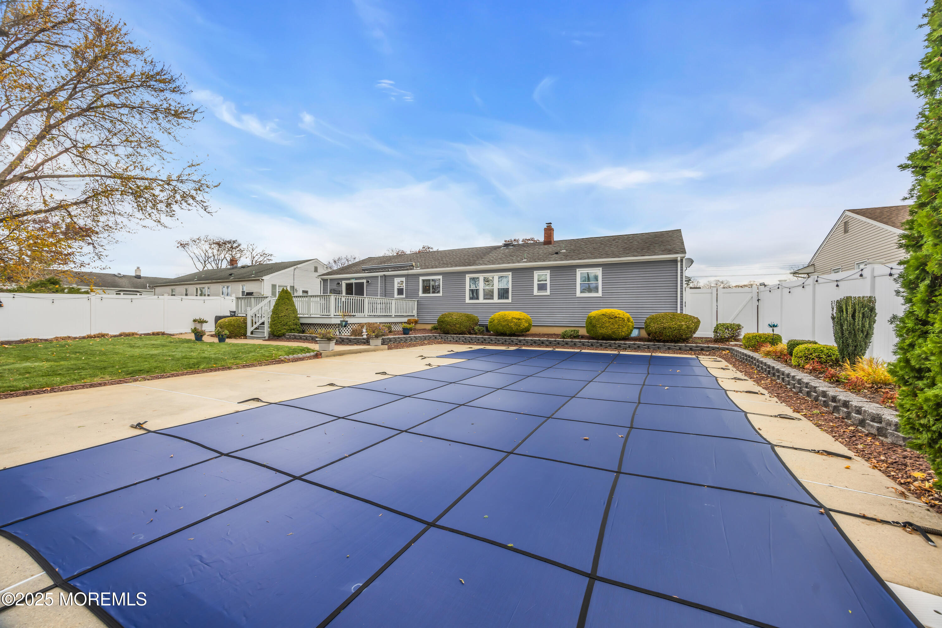 308 Green Tree Road Brick, NJ 08724 - Photo 48 of 58 a view of a swimming pool with a patio