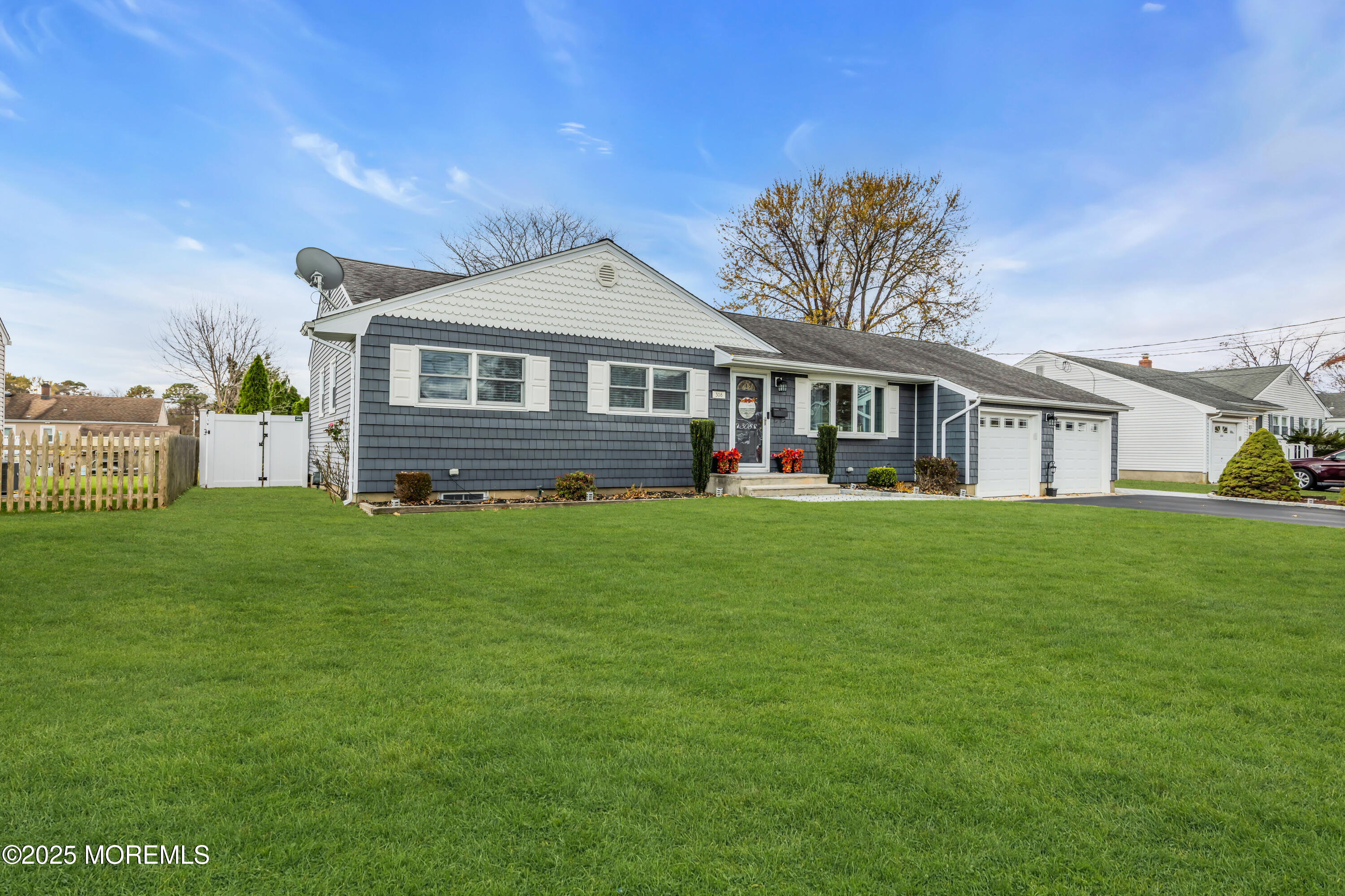 308 Green Tree Road Brick, NJ 08724 - Photo 5 of 58 a front view of house with yard and green space
