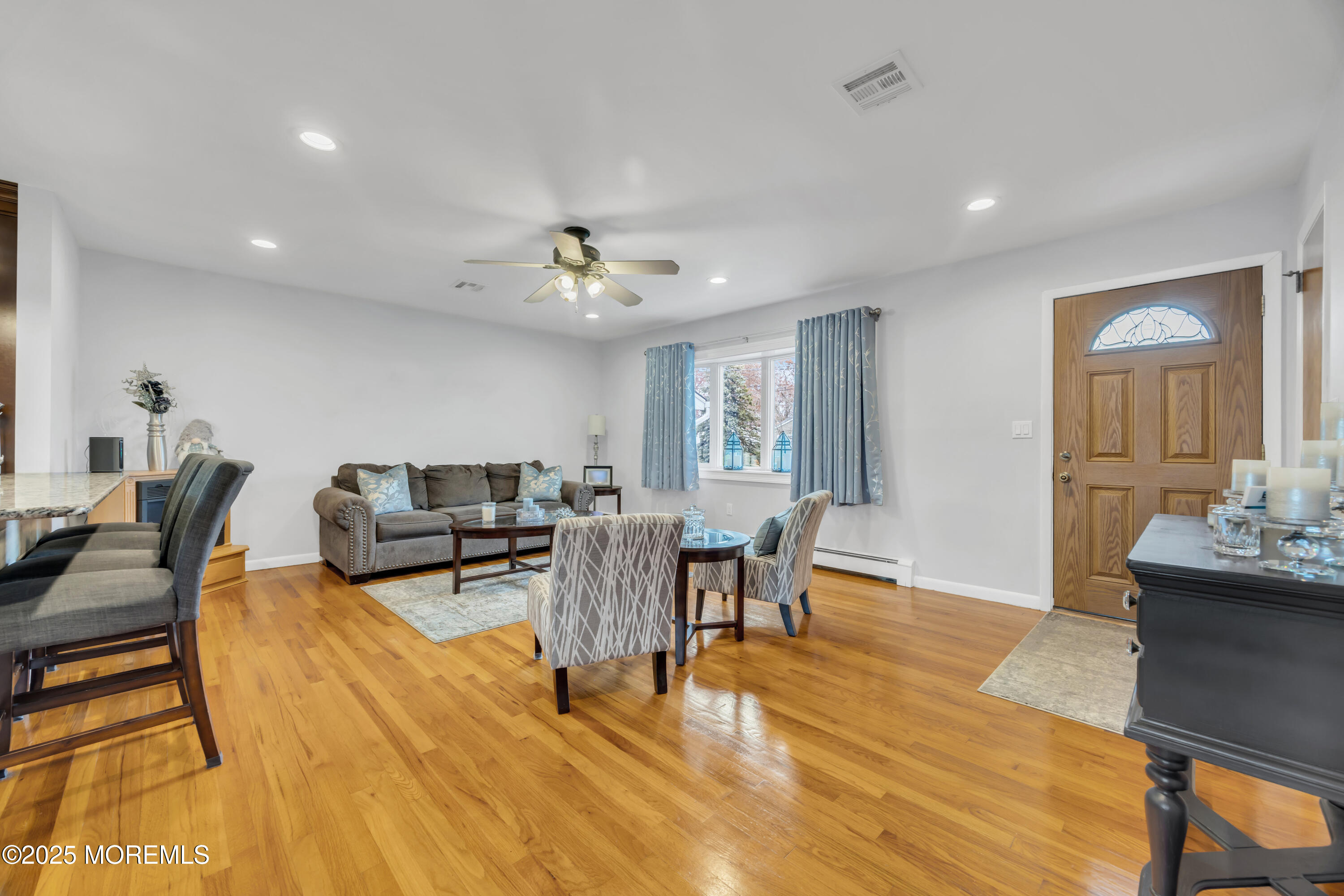 308 Green Tree Road Brick, NJ 08724 - Photo 7 of 58 a living room with furniture and wooden floor