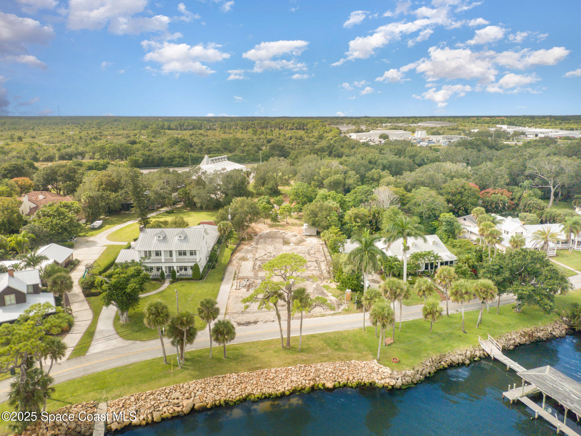1863 Rockledge Drive Rockledge, FL 32955 - Photo 11 of 43 an aerial view of residential houses with outdoor space