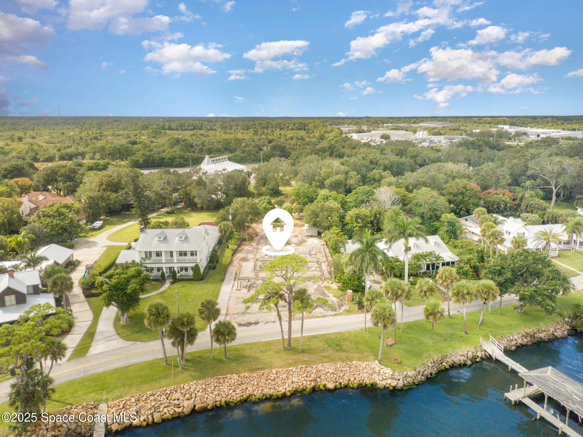 1863 Rockledge Drive Rockledge, FL 32955 - Photo 3 of 43 an aerial view of residential houses with outdoor space