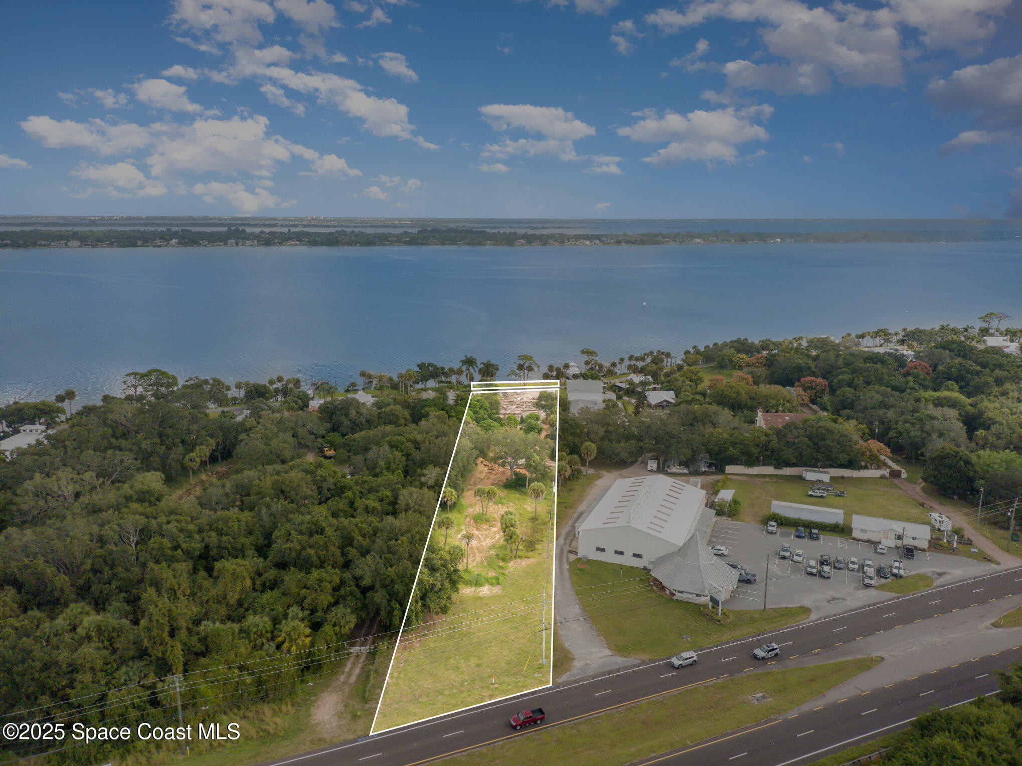 1863 Rockledge Drive Rockledge, FL 32955 - Photo 4 of 43 an aerial view of residential houses with outdoor space