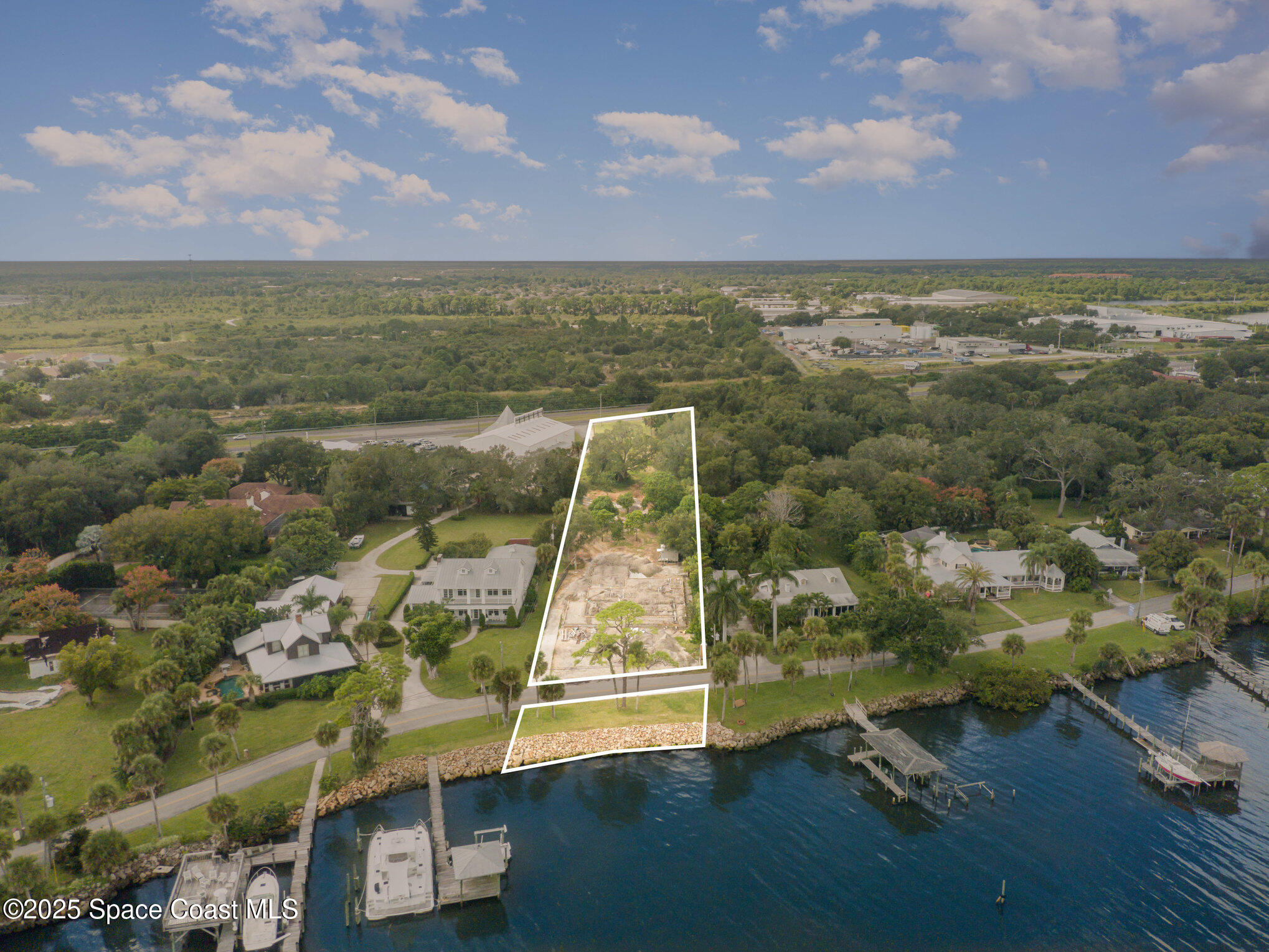 1863 Rockledge Drive Rockledge, FL 32955 - Photo 5 of 43 an aerial view of residential houses with outdoor space