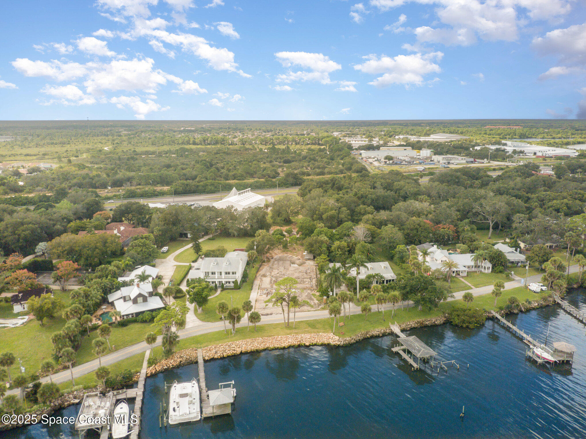 1863 Rockledge Drive Rockledge, FL 32955 - Photo 7 of 43 an aerial view of residential houses with outdoor space