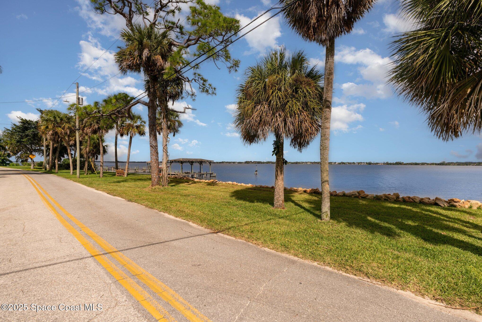 1863 Rockledge Drive Rockledge, FL 32955 - Photo 8 of 43 a view of swimming pool with a garden