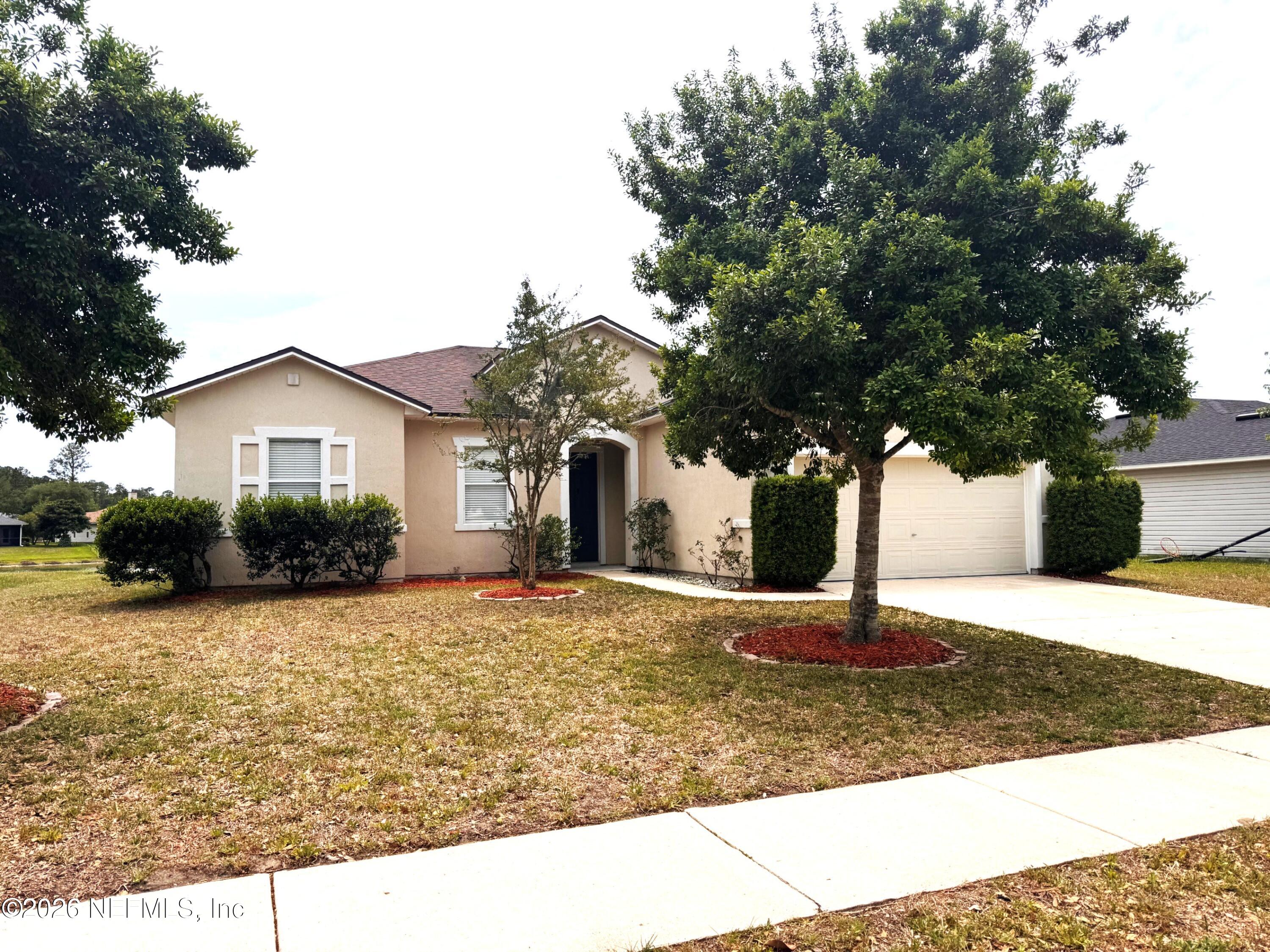 76236 Long Pond Loop Yulee, FL 32097 - Photo 1 of 20 front