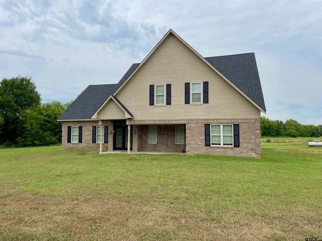 a house that has a lot of plants in it