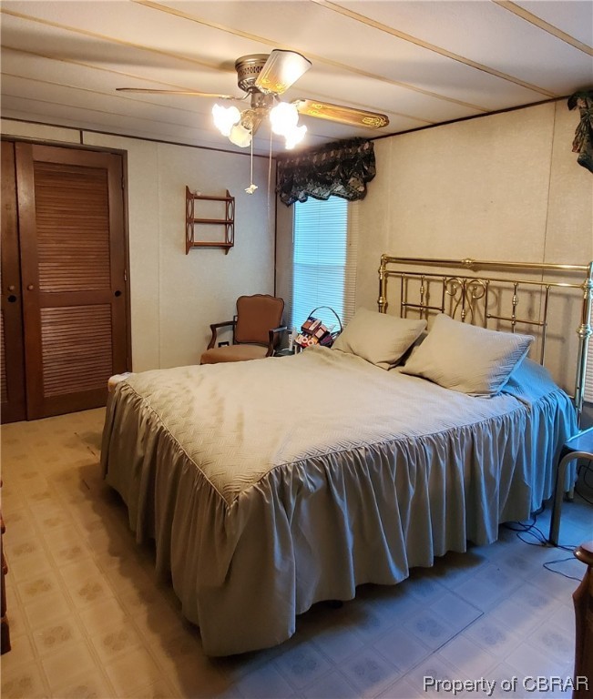 368 Osprey Road Cardinal, VA 23025 - Photo 21 of 23 a bed sitting in a bedroom next to a window