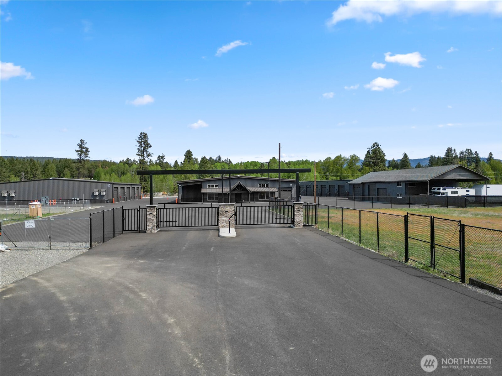 4081 Highway 970, Unit D7 Cle Elum, WA 98922 - Photo 10 of 27 a view of swimming pool with outdoor seating and plants