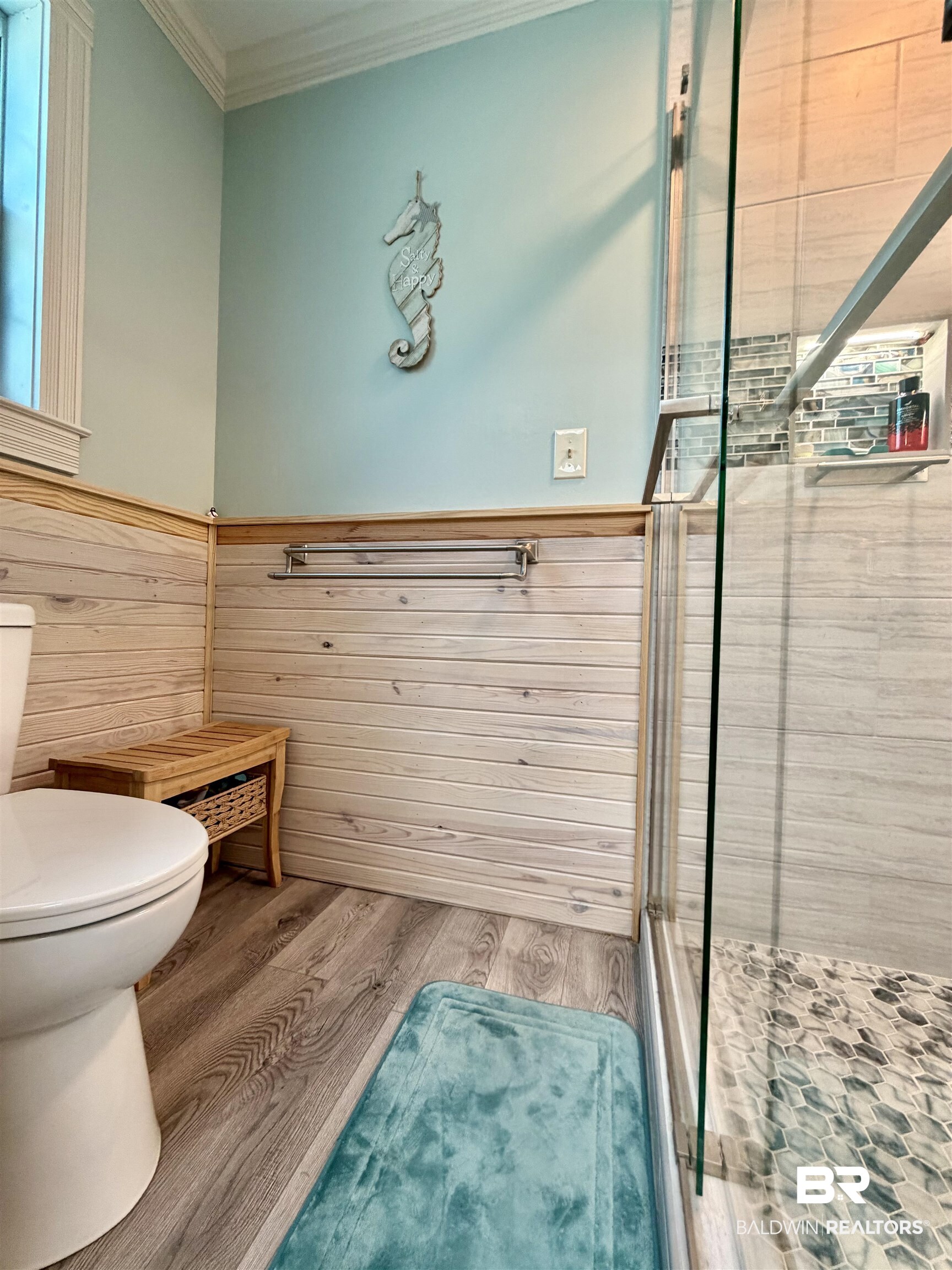 2944 Appleton Road Brewton, AL 36426 - Photo 21 of 65 Full bathroom featuring a shower stall, light wood-style floors, ornamental molding, and wainscoting