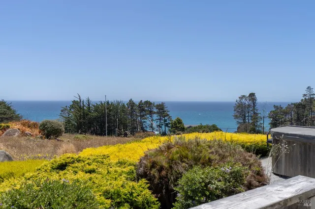 a view of balcony with wooden floor and outdoor space