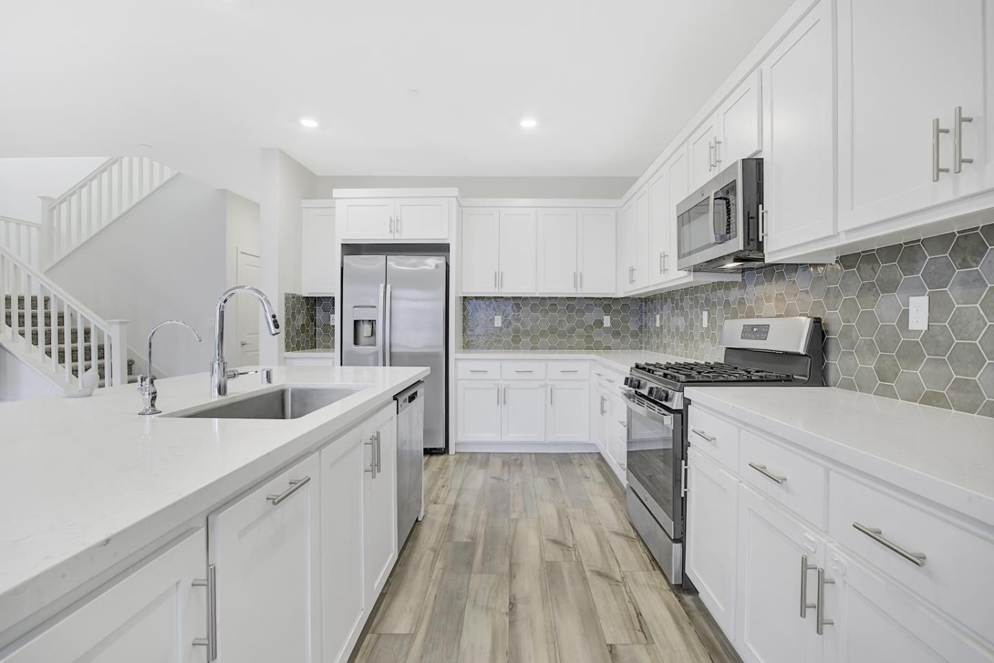 5161 Maniago Way Antioch, CA 94531 - Photo 13 of 42 a kitchen with cabinets appliances a sink and a counter top space