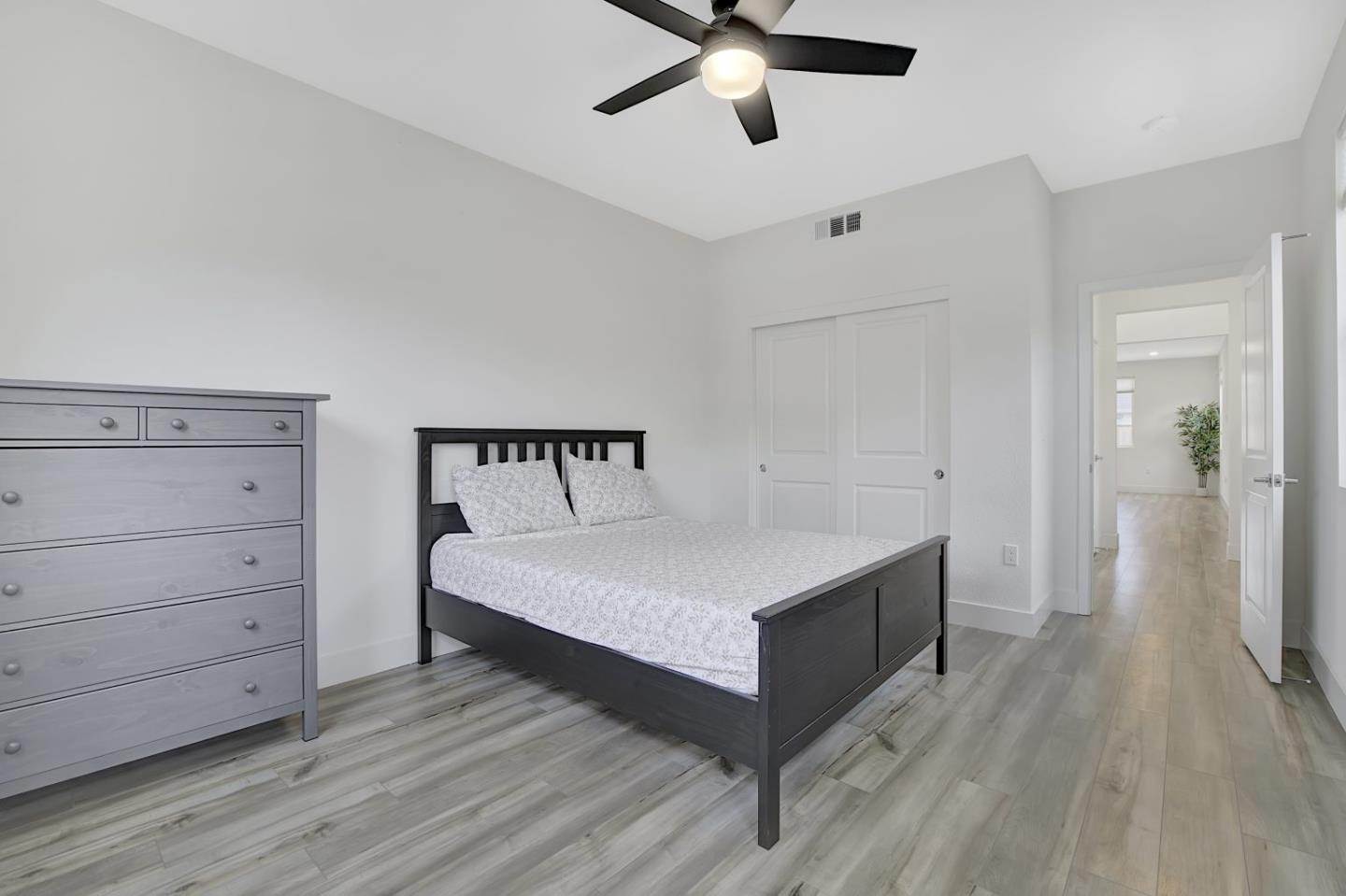 5161 Maniago Way Antioch, CA 94531 - Photo 20 of 42 a bedroom with a bed and a dresser