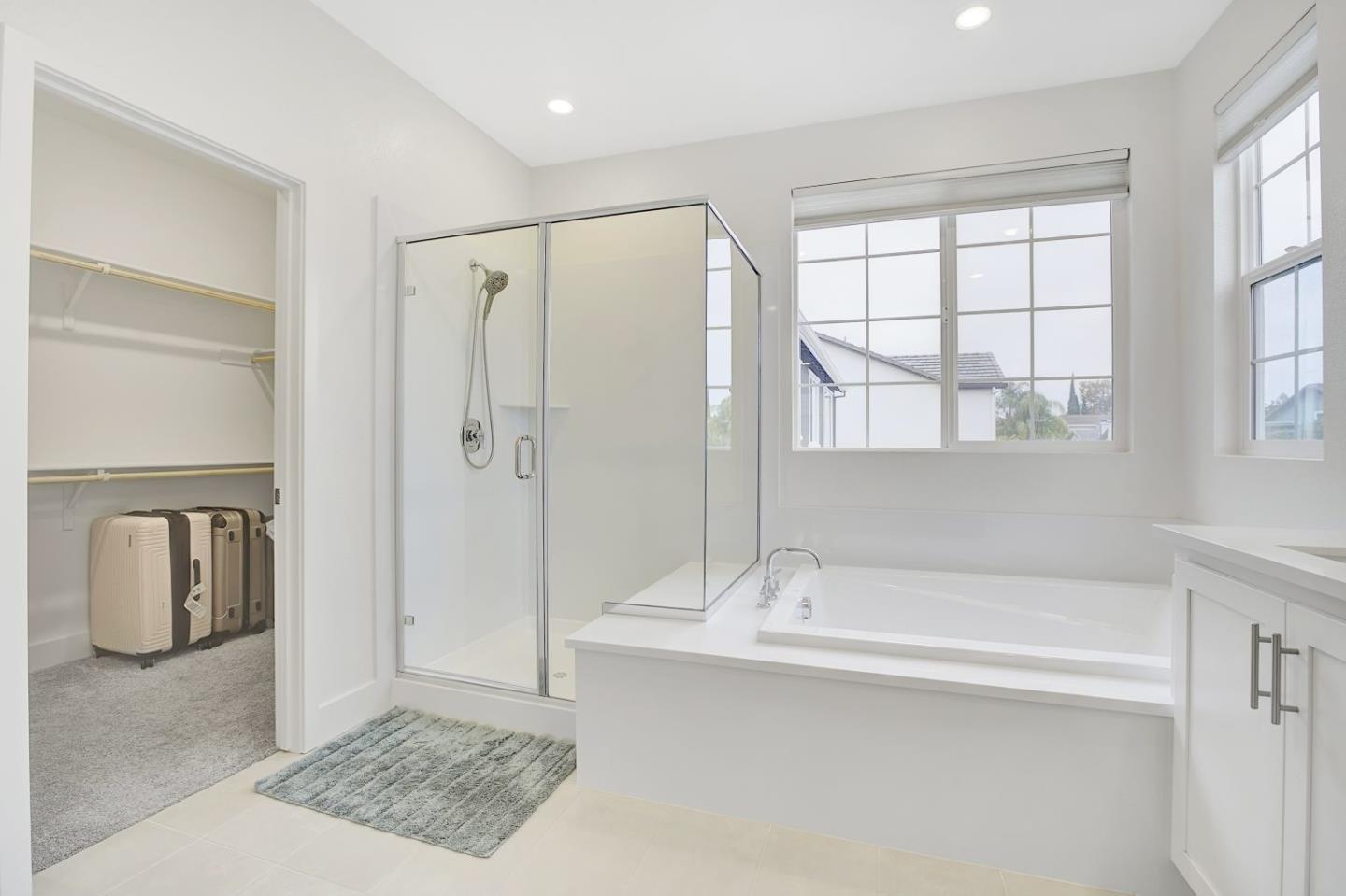 5161 Maniago Way Antioch, CA 94531 - Photo 36 of 42 a bathroom with a tub sink and mirror