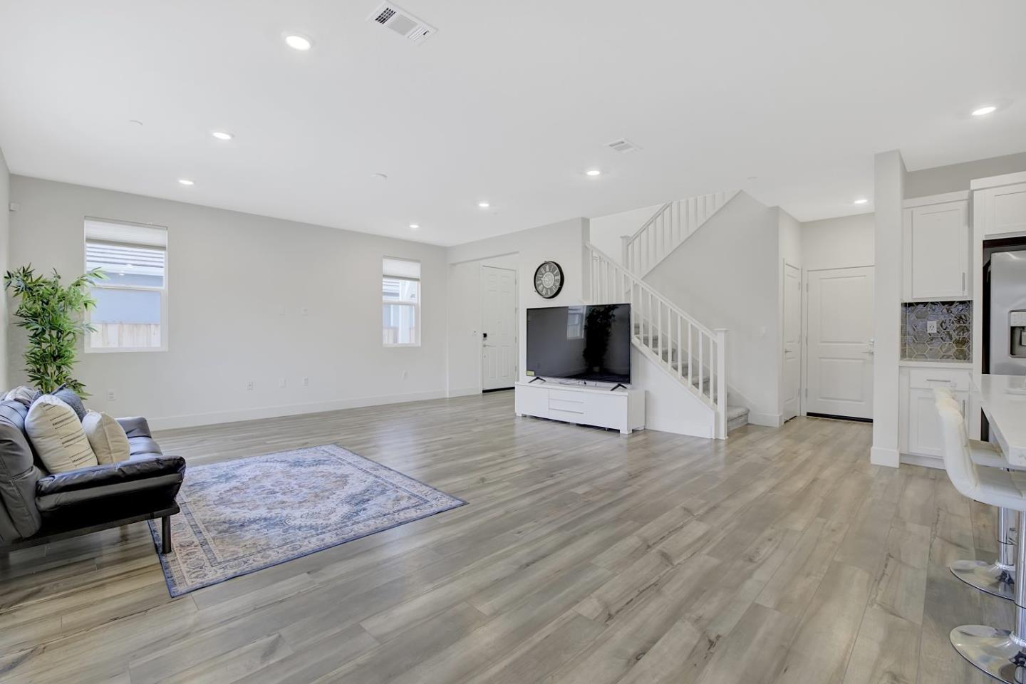 5161 Maniago Way Antioch, CA 94531 - Photo 8 of 42 a living room with furniture and a flat screen tv