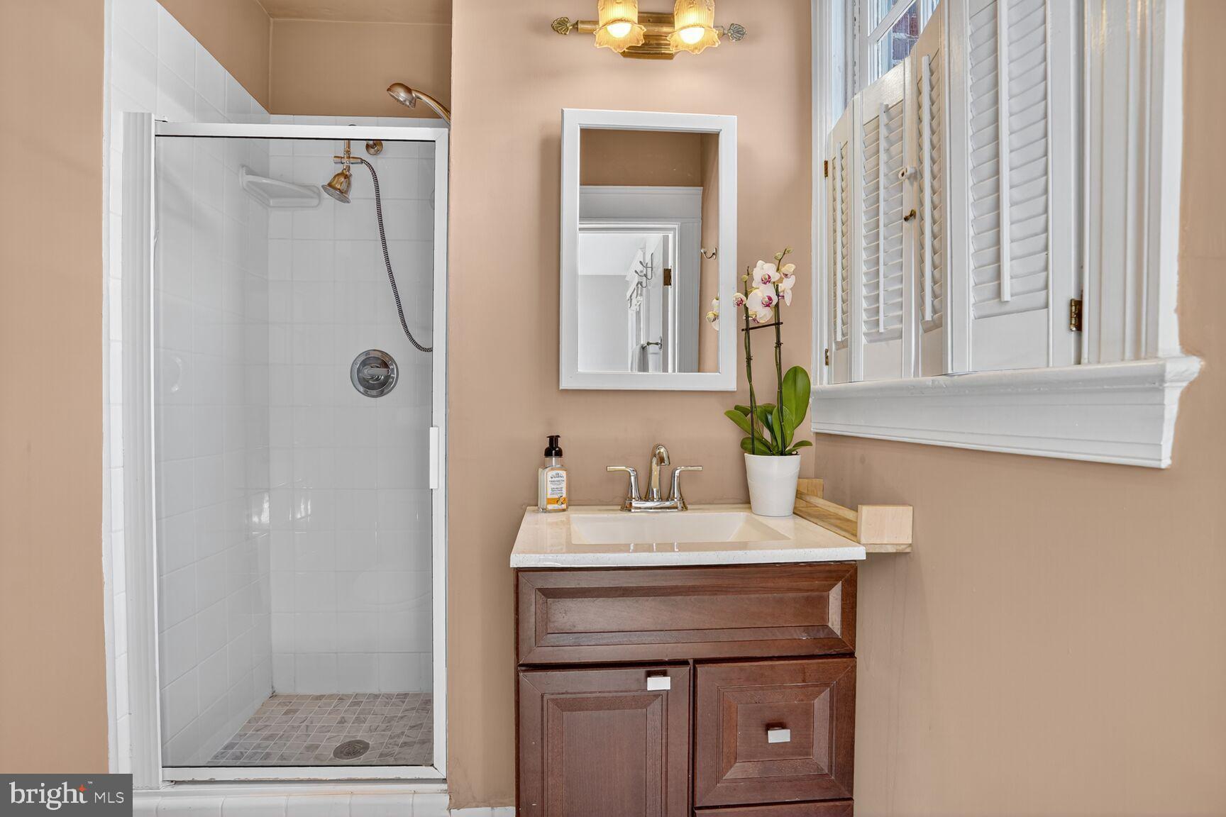 4302 37th Street Northwest Washington, DC 20008 - Photo 23 of 39 Elegant bathroom with modern fixtures.