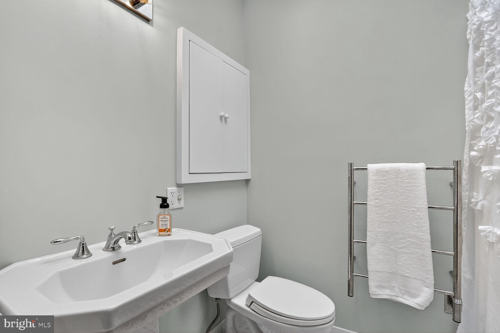 4302 37th Street Northwest Washington, DC 20008 - Photo 26 of 39 Modern bathroom with sleek fixtures.