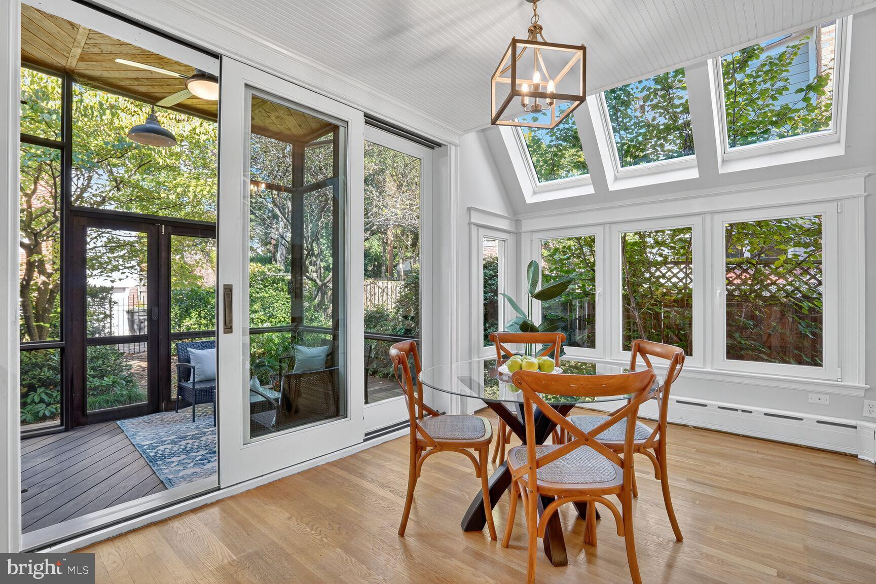 4302 37th Street Northwest Washington, DC 20008 - Photo 10 of 39 Bright sunlit dining space with garden views.