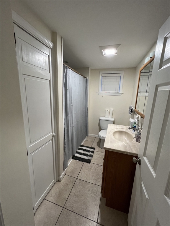 36 Hunting Street, Unit 2 Cambridge, MA 02141 - Photo 15 of 19 a kitchen with a refrigerator and a sink