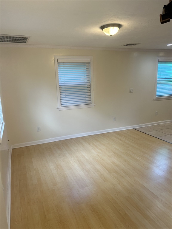 36 Hunting Street, Unit 2 Cambridge, MA 02141 - Photo 7 of 19 an empty room with a workbench