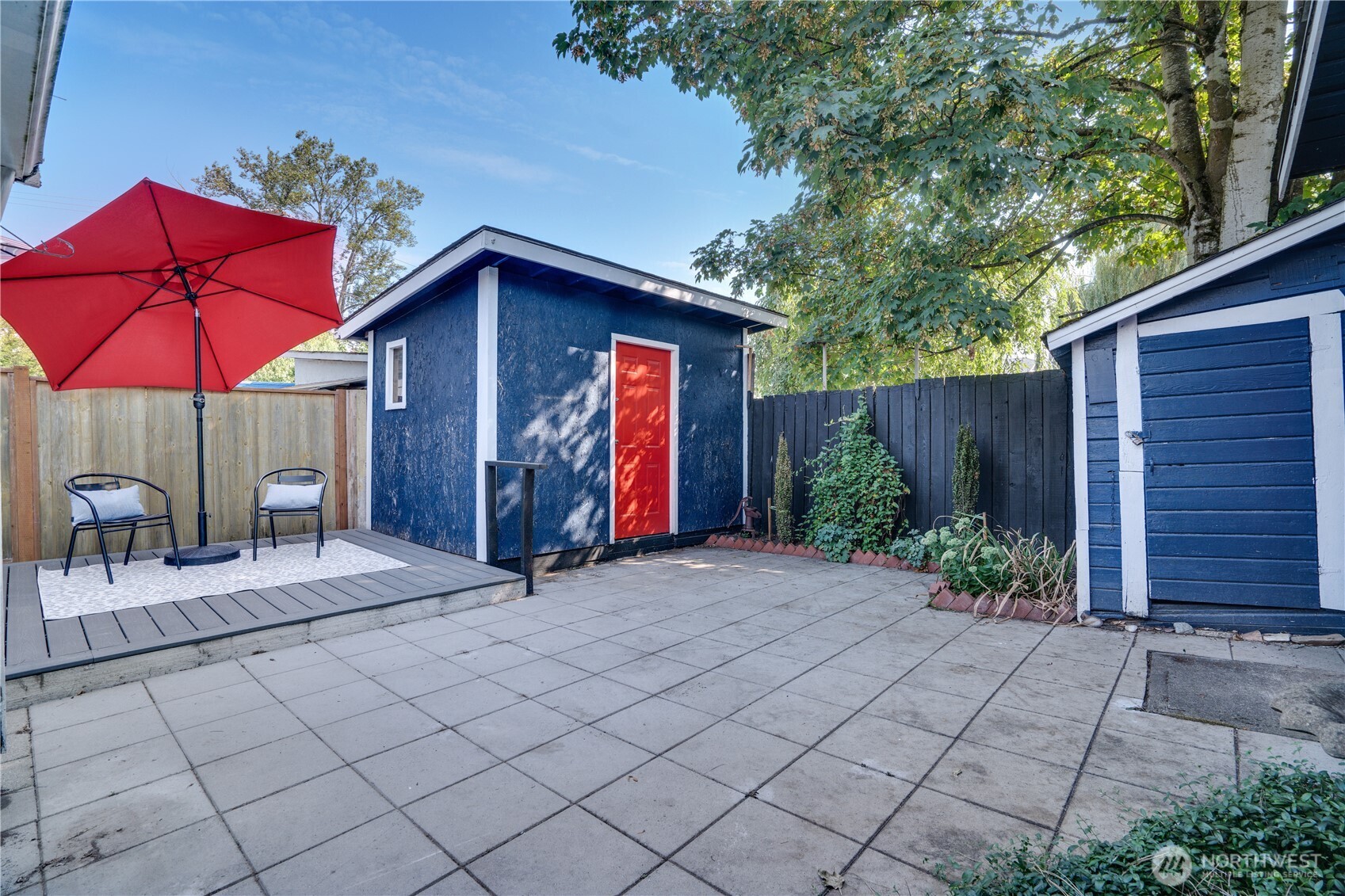 911 Hunt Avenue Sumner, WA 98390 - Photo 22 of 29 a view of a house with backyard and sitting area