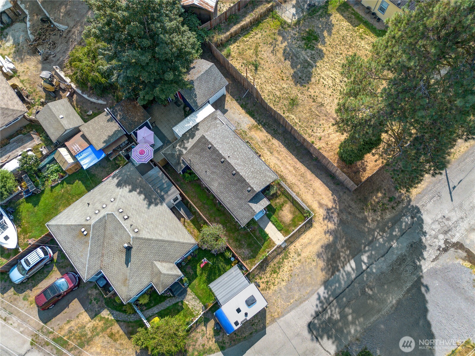 911 Hunt Avenue Sumner, WA 98390 - Photo 3 of 29 an aerial view of a house with a yard