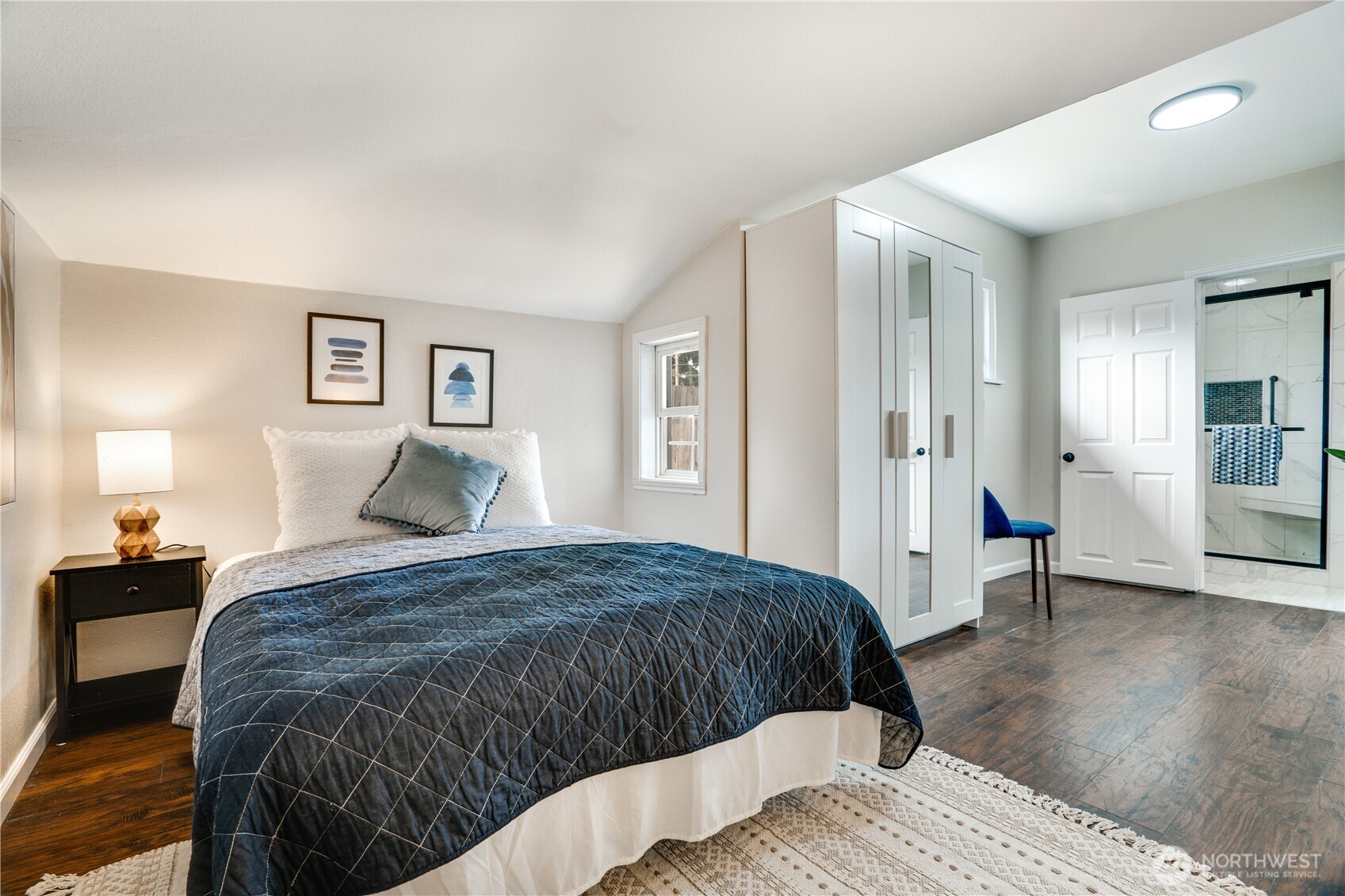 911 Hunt Avenue Sumner, WA 98390 - Photo 10 of 29 a bedroom with a bed and a view of bathroom