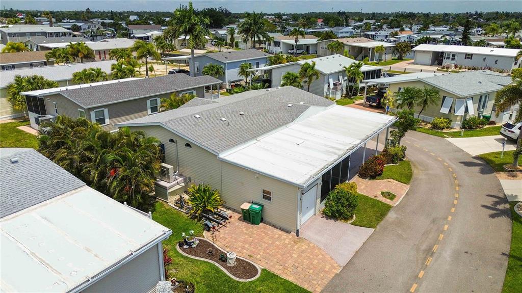 18 Emden Circle Punta Gorda, FL 33950 - Photo 12 of 61 an aerial view of a house with a yard and lake view