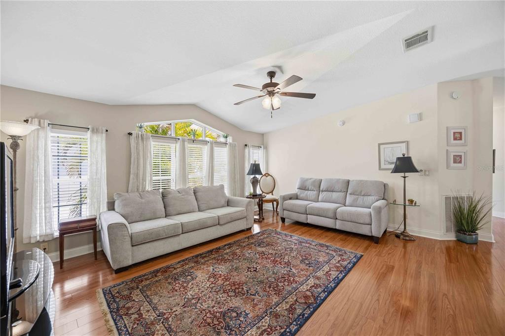 18 Emden Circle Punta Gorda, FL 33950 - Photo 15 of 61 a living room with furniture and a large window