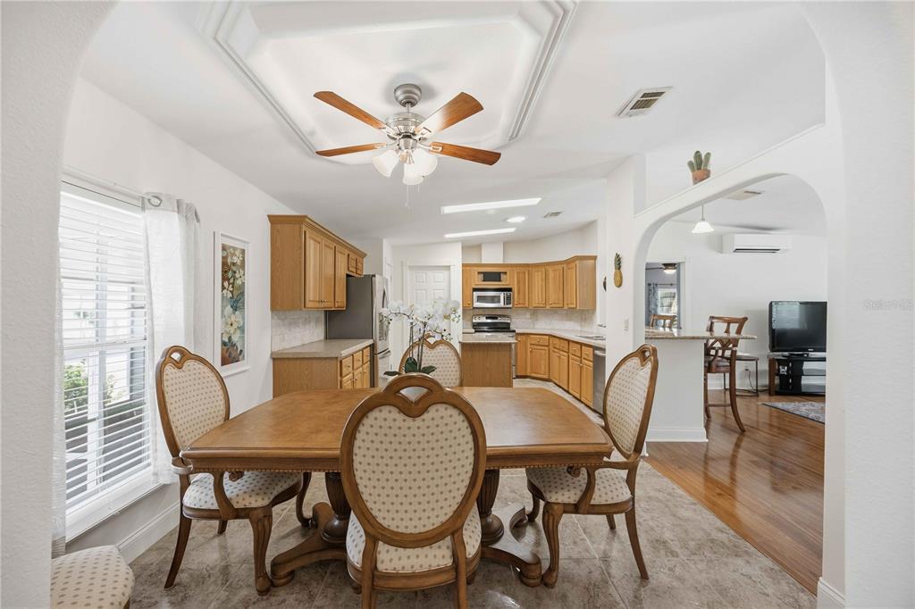 18 Emden Circle Punta Gorda, FL 33950 - Photo 27 of 61 a dining room with furniture a window and wooden floor
